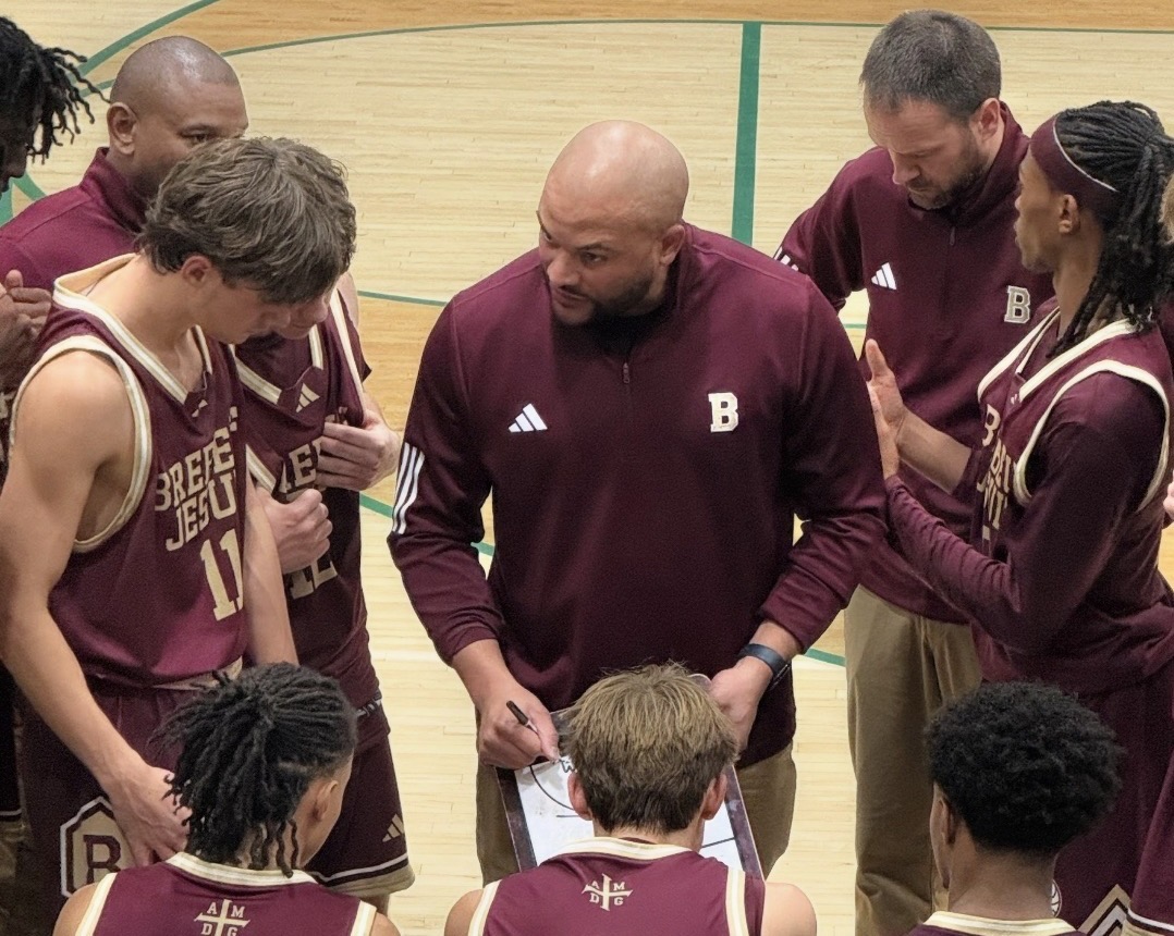 Ron coaching during a game timeout